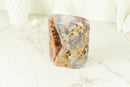 Kleiner rosa Amethyst, selbststehend, mit rosa und rotem Amethyst-Druzy