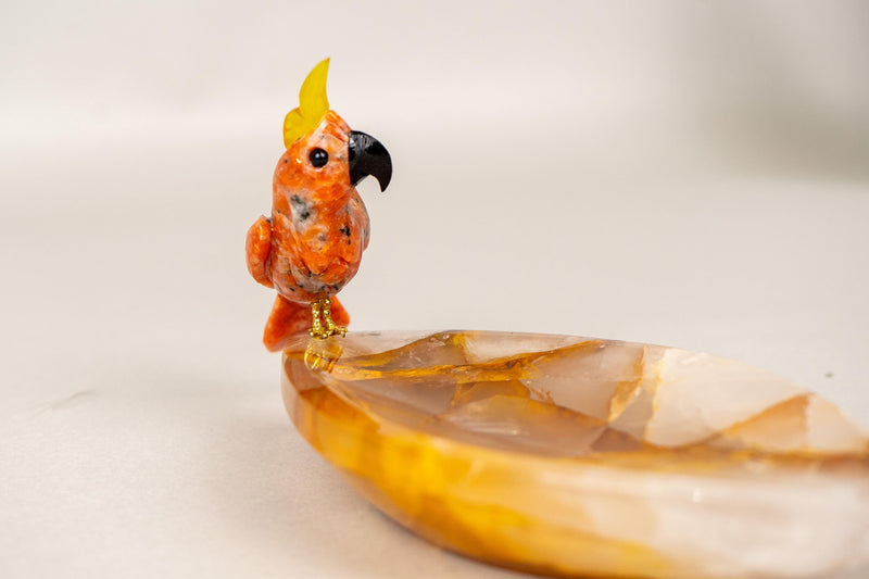 Hand - Carved Red Quartz Cockatoo on a Hematite Golden Healer Crystal Bowl - E2D Crystals & Minerals