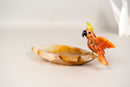 Hand - Carved Red Quartz Cockatoo on a Hematite Golden Healer Crystal Bowl - E2D Crystals & Minerals