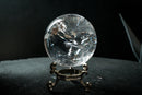 Water-Clear Quartz Sphere with Vivid Rainbows & Leaf-Shaped Feather Inclusions – Diamantina, Brazil (71 mm | 460 g) - E2D Crystals & Minerals