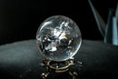Water-Clear Quartz Sphere with Vivid Rainbows & Leaf-Shaped Feather Inclusions – Diamantina, Brazil (71 mm | 460 g) - E2D Crystals & Minerals
