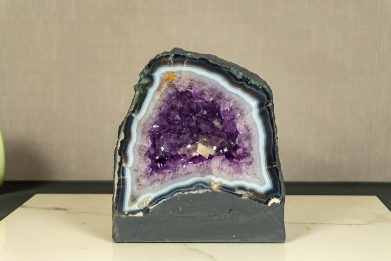 Pair of Small Purple Amethyst Cathedral Geodes on Blue Banded Agate collective